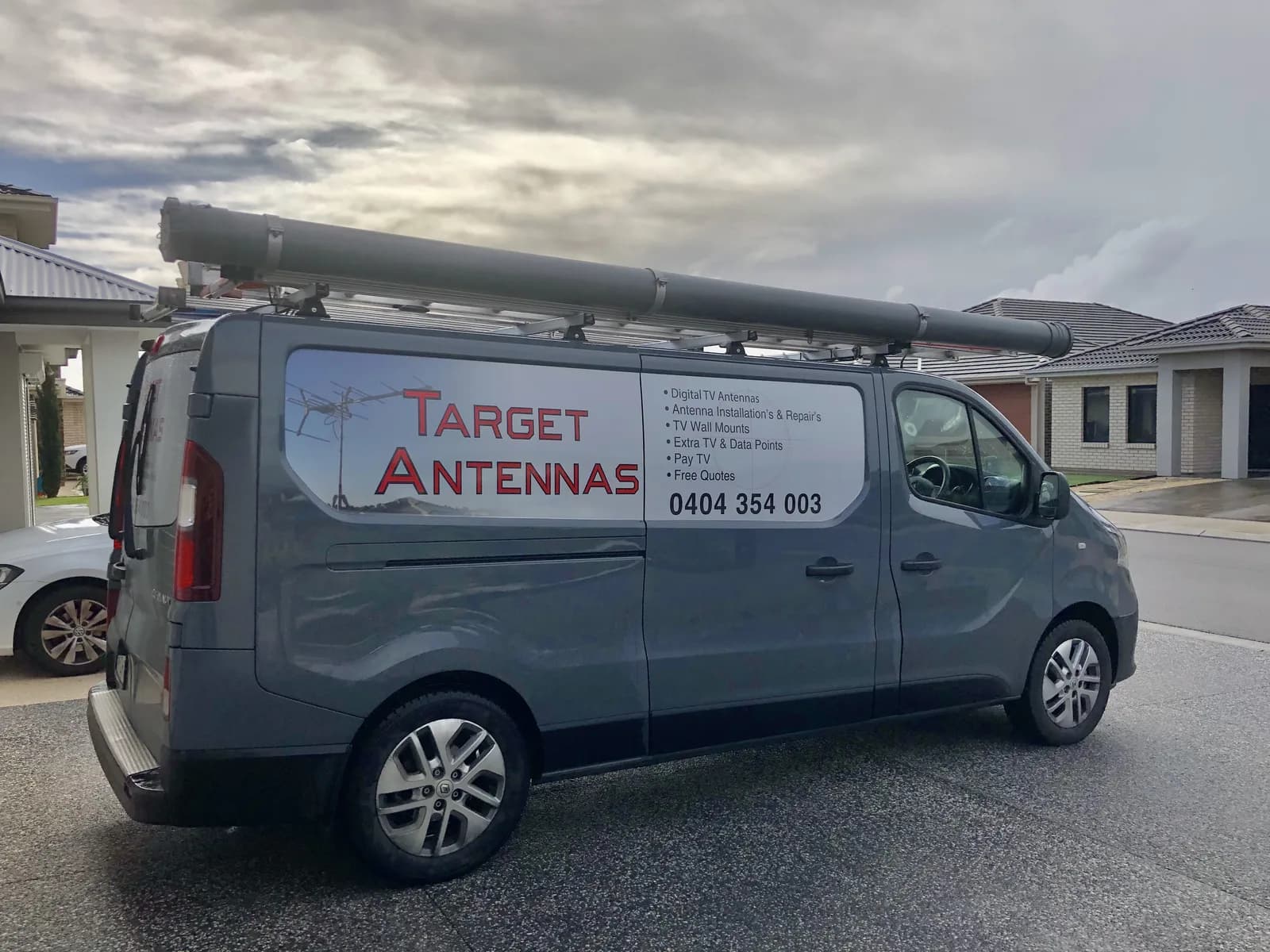 The Target Antennas work van outside an Adelaide home